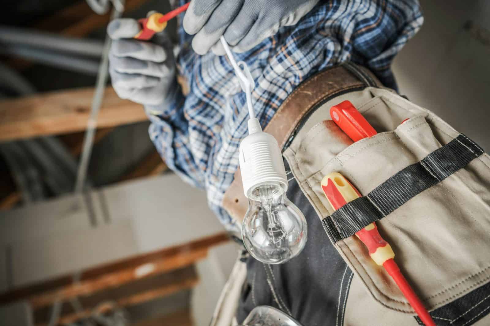 Lighting Installation Electrician Installing New Light Point Inside a House